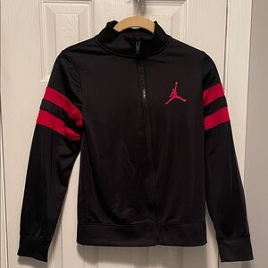 Jordan Boys Black Windbreaker with Red Accents. Very Nice Size M